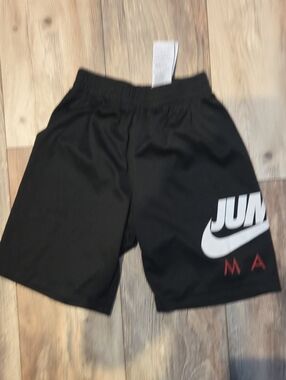 Nike Black Men's Athletic Shorts with White Swoosh and Red Accents